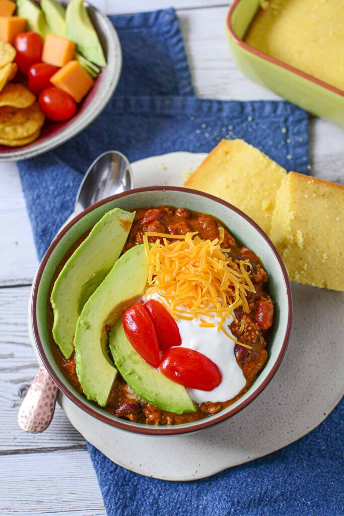 3 Ingredient chili with delicious garnishes on top.
