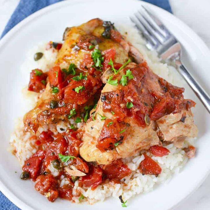 An overhead photo of the chicken dinner on a white plate.
