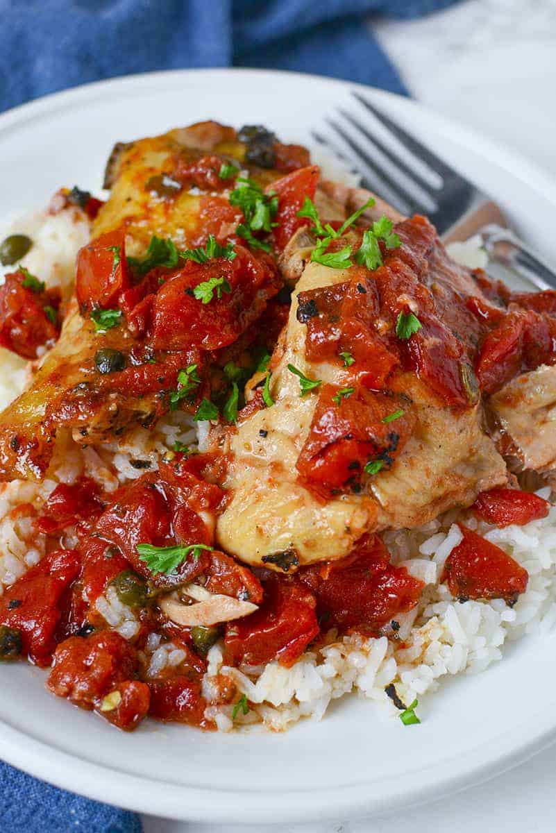 3 ingredient Tuscan chicken served over rice.