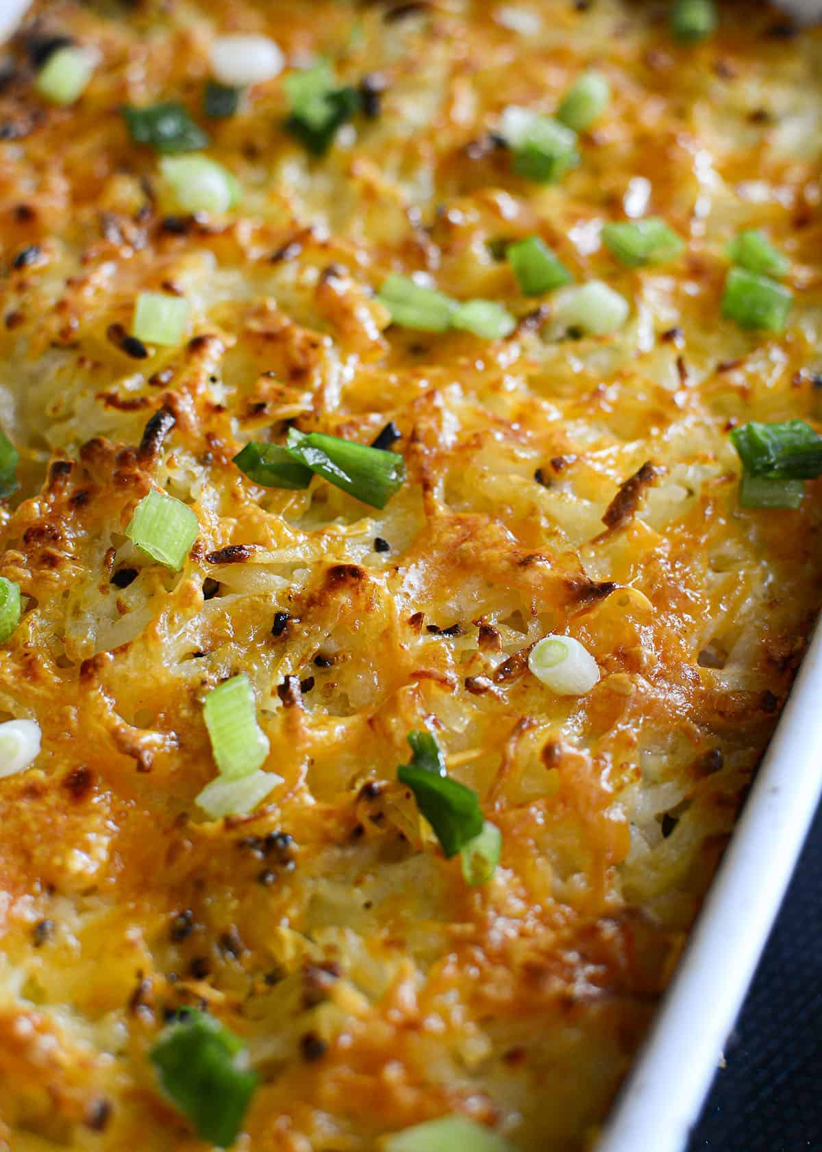 The hashbrown bake just out of the oven with green onions sprinkled over top.