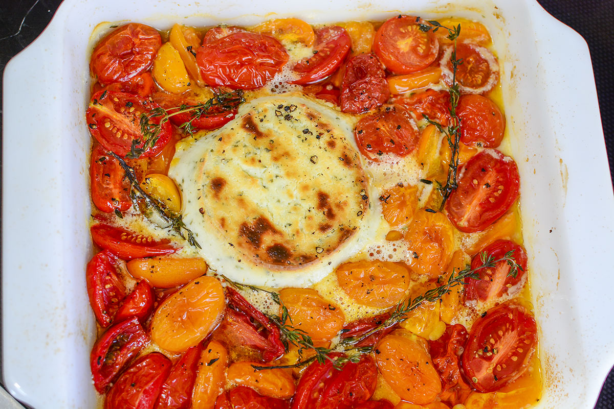 Tomatoes and cheese that have been baked in the oven.
