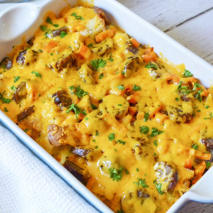 The Bratwurst Breakfast Bake with only 5 Ingredients in a white and blue baking dish.