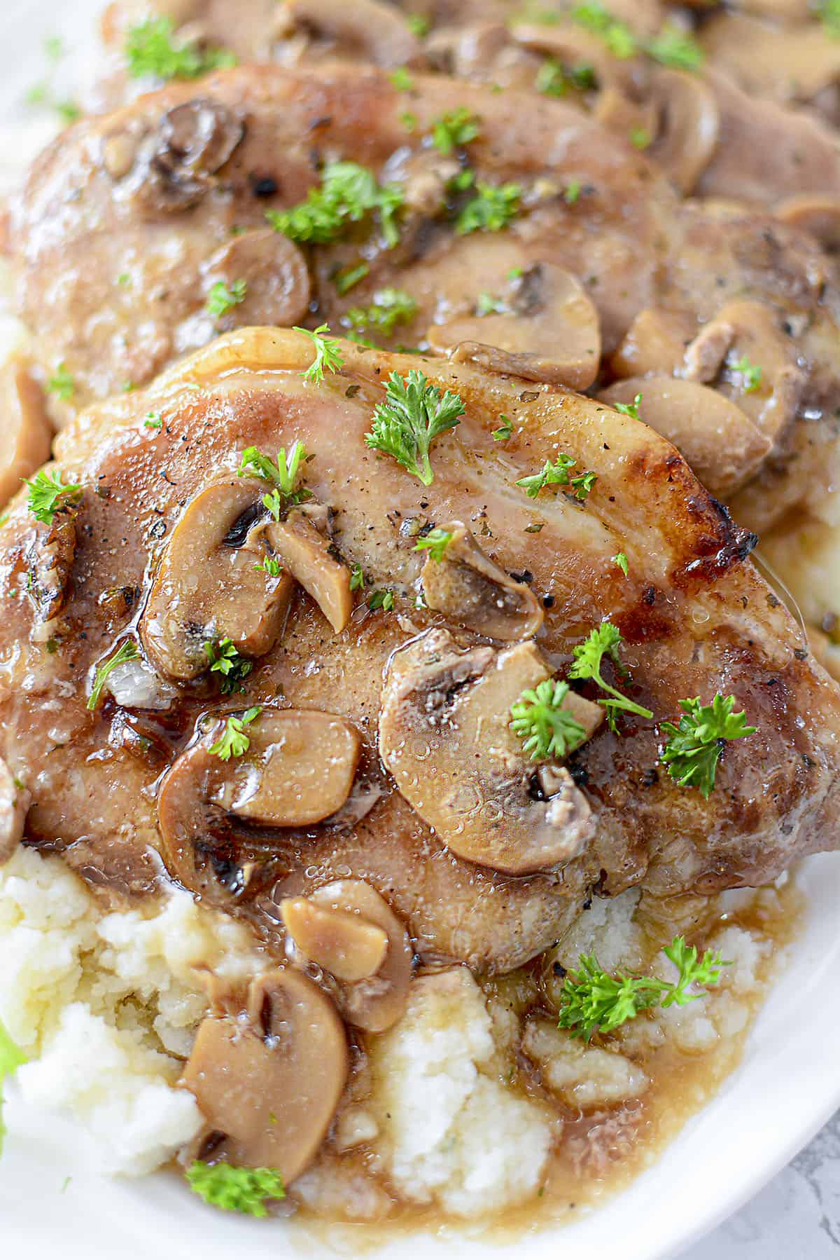 A zoomed in photo of the mushrooms that were added to the pork chops. 