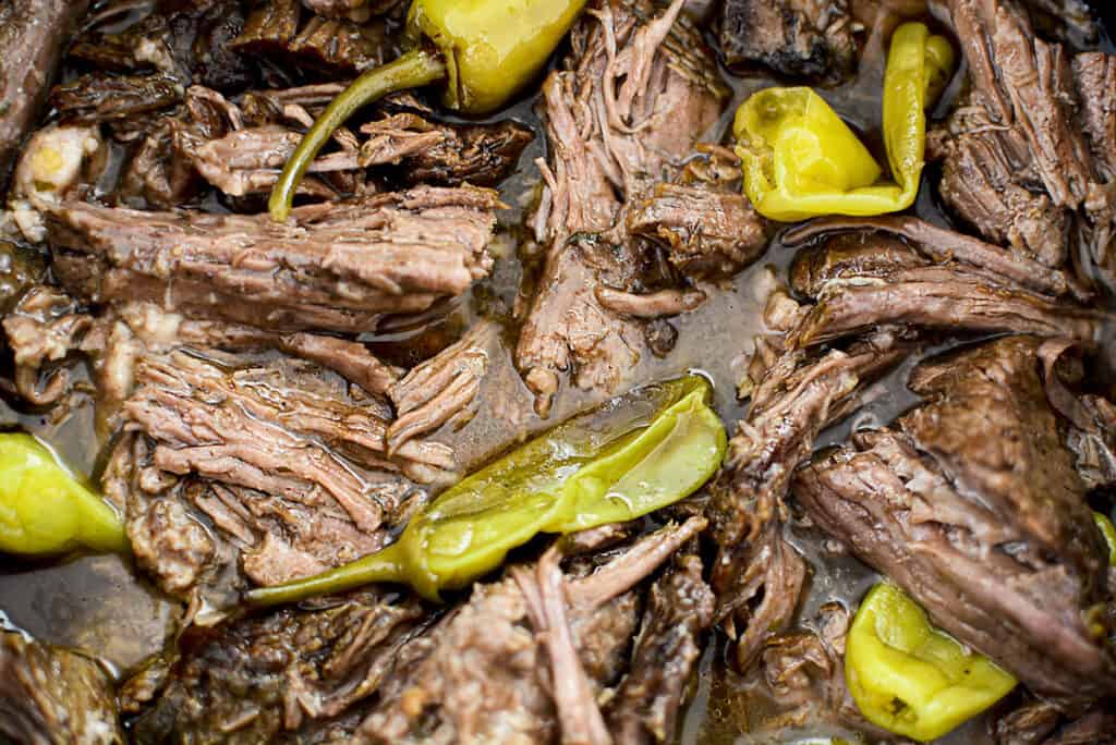 A close up of the shredded beef and peppers.