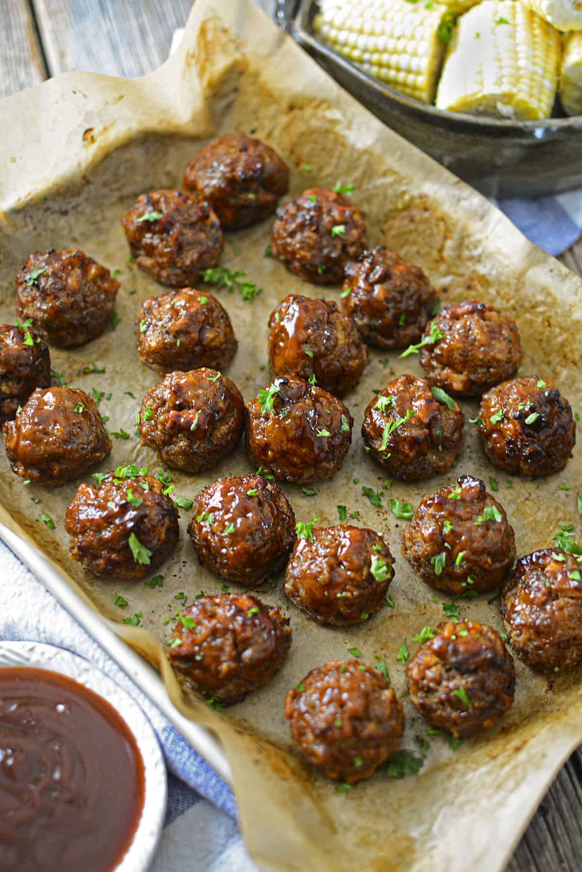 Meatballs with stuffing brushed with BBQ sauce. 