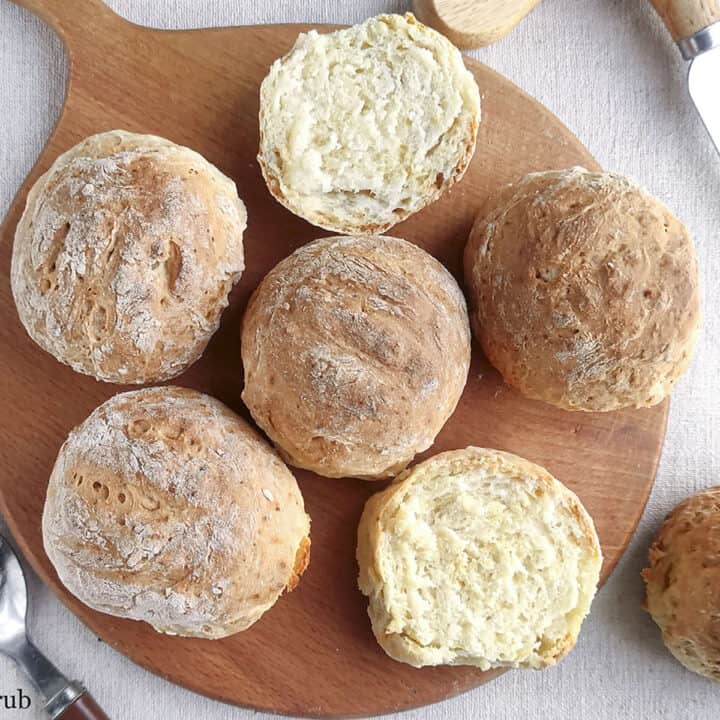 2 Ingredient rolls on a wooden cutting board.