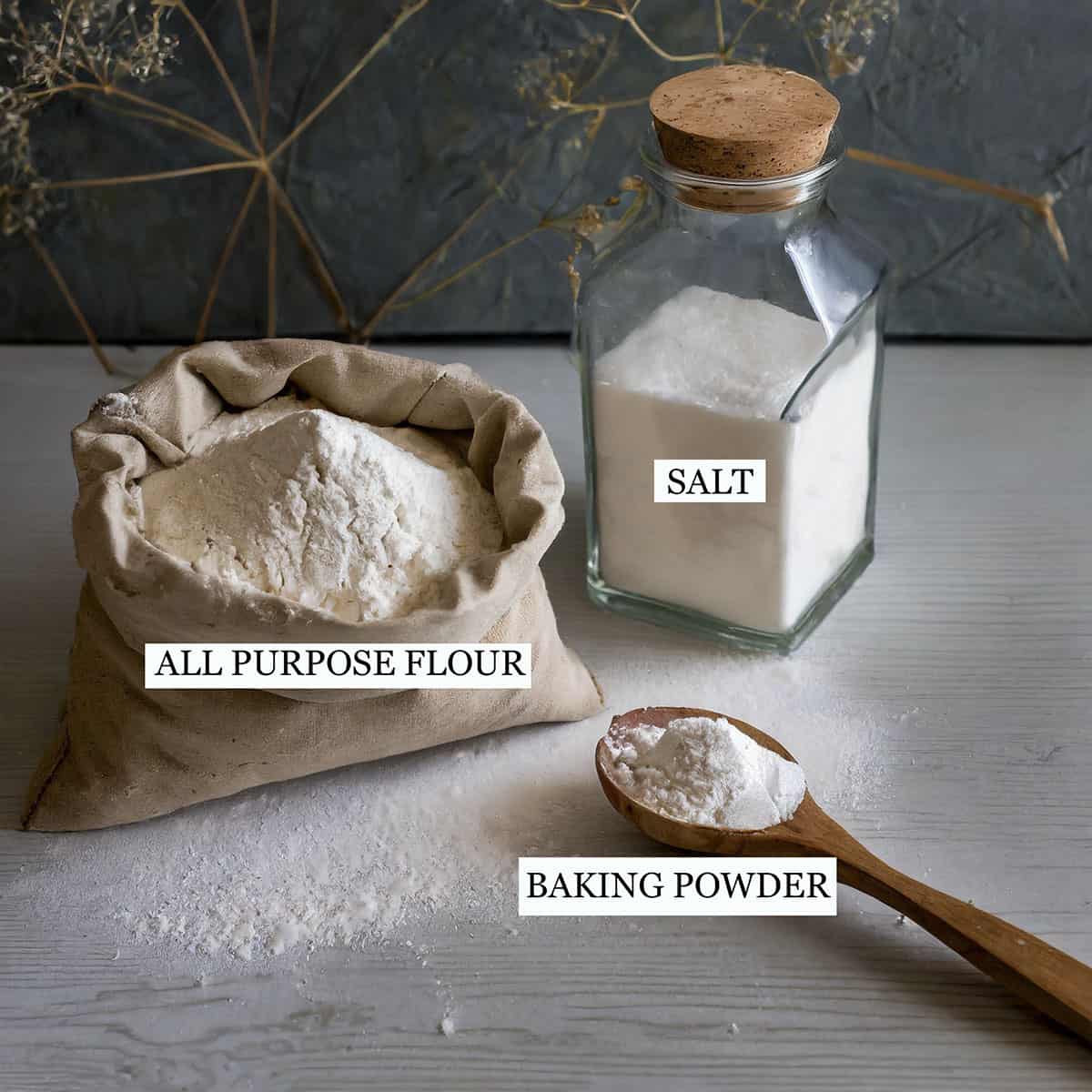 Ingredients needed to make self rising flour. All purpose flour, salt and baking powder.