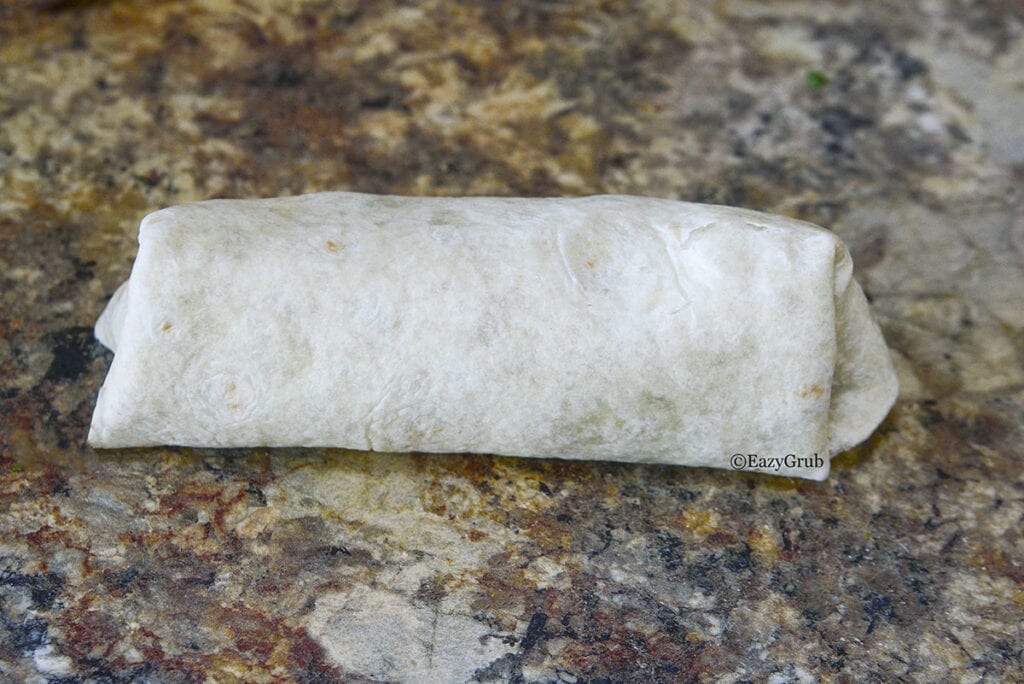 All the ingredients are wrapped up into a burrito, ready to serve.