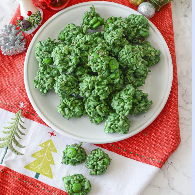 Grinch poop on a white plate square image.