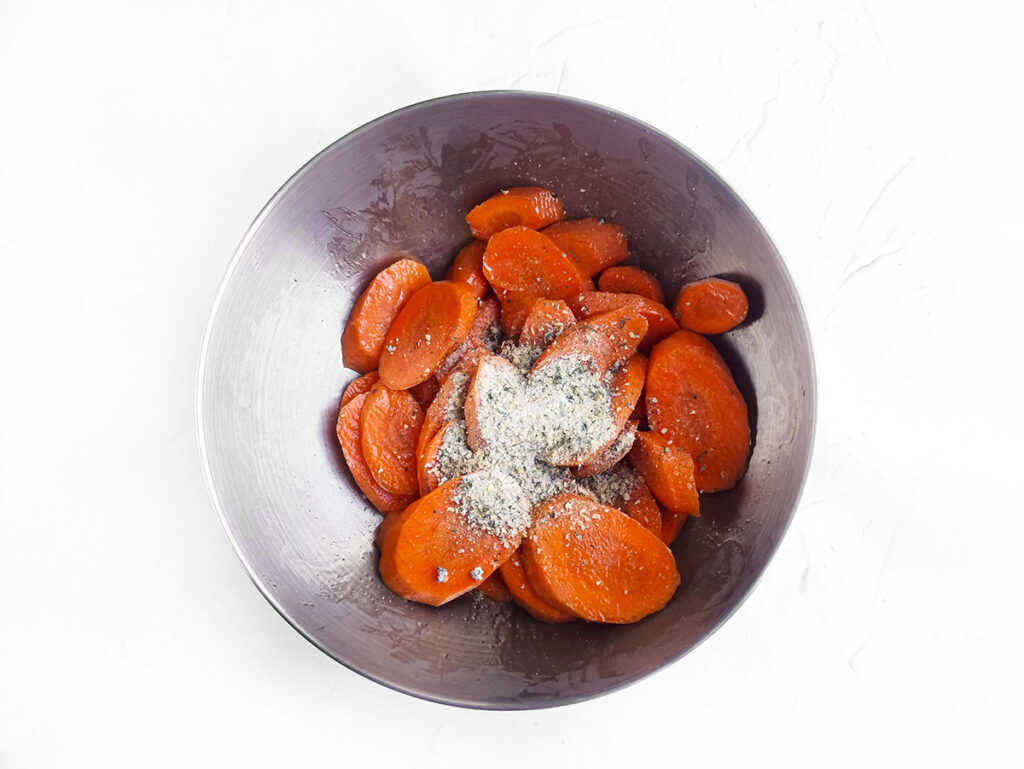 Carrots with Ranch powdered seasoning on them.