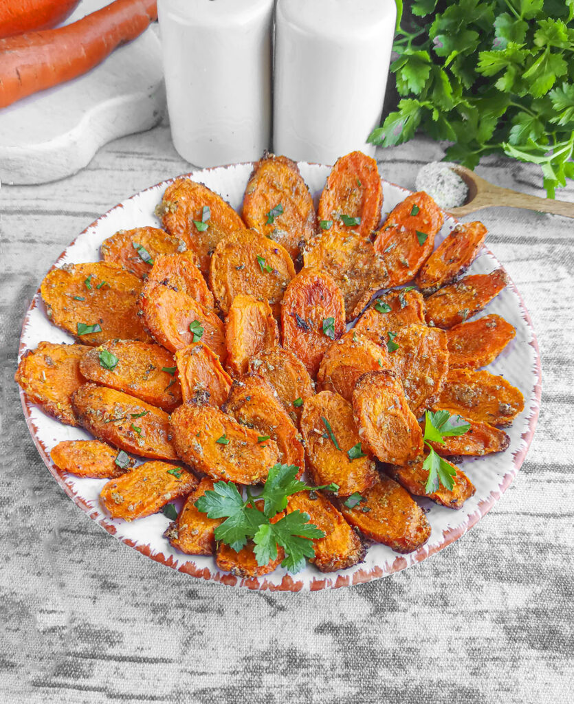 Ranch carrots on a white plate.