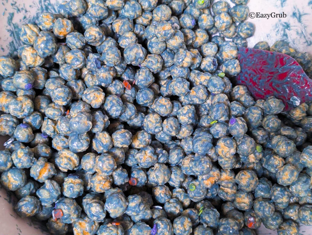 Cereal coated in colored chocolate.