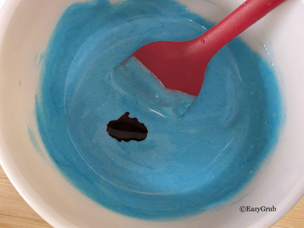 Melted chocolate colored with food coloring.