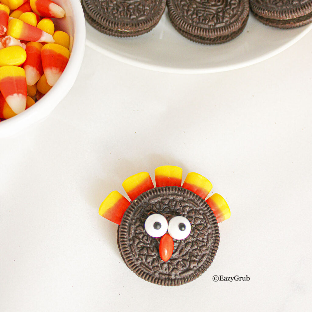 Candy eyes and nose are placed in the center.