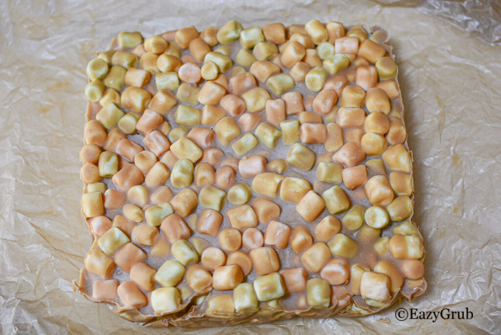 The squares on a parchment, chilled and unsliced.