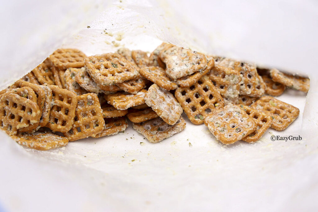 Seasoned pretzels in a clear bag.