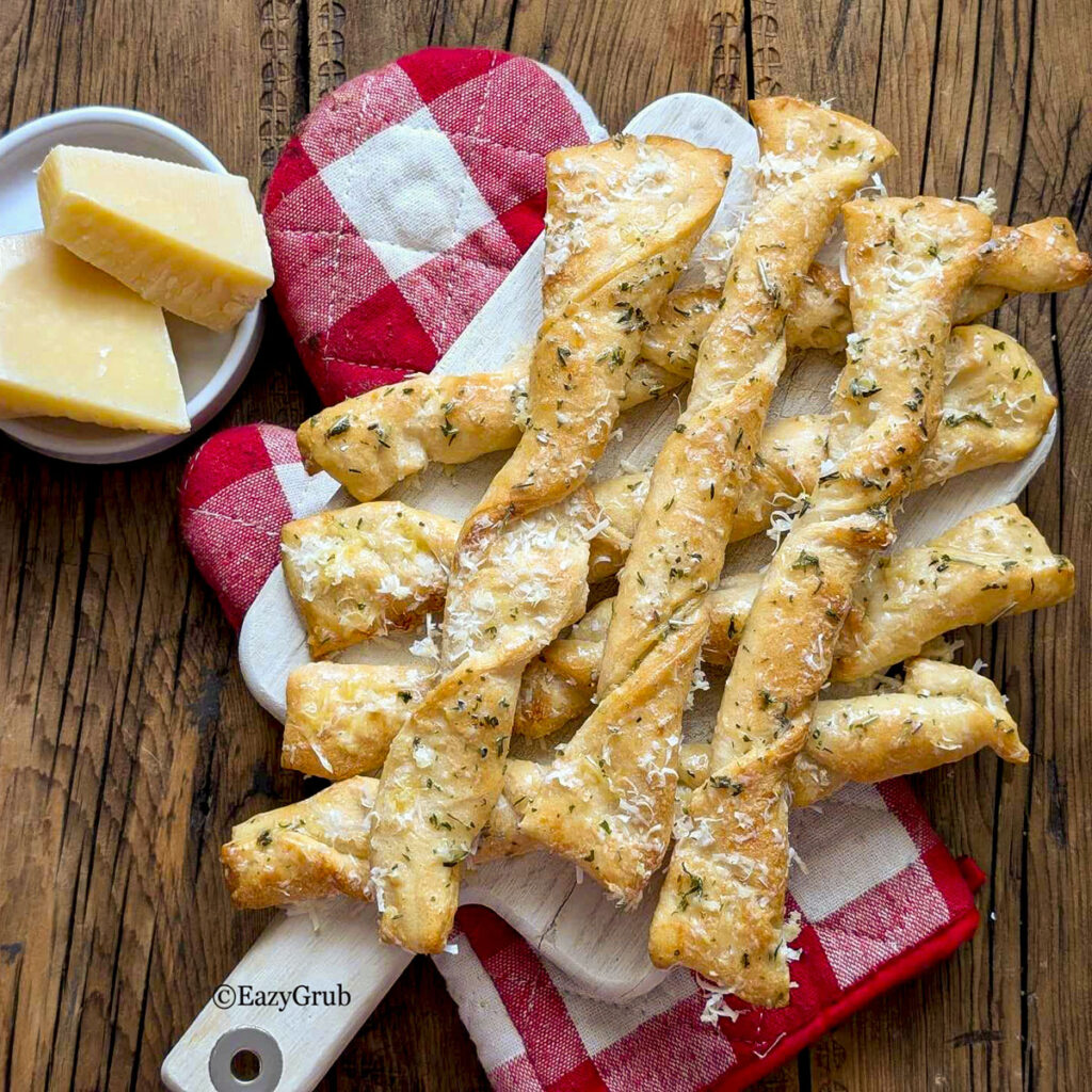 Garlic parmesan sticks snack Square image.