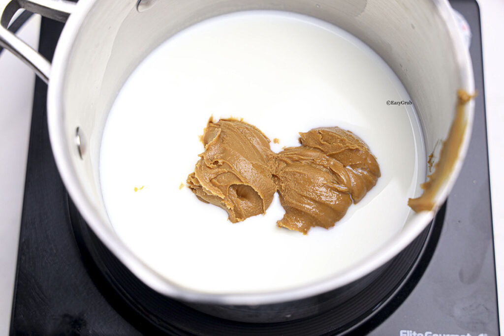 milk and Biscoff spread in a pan