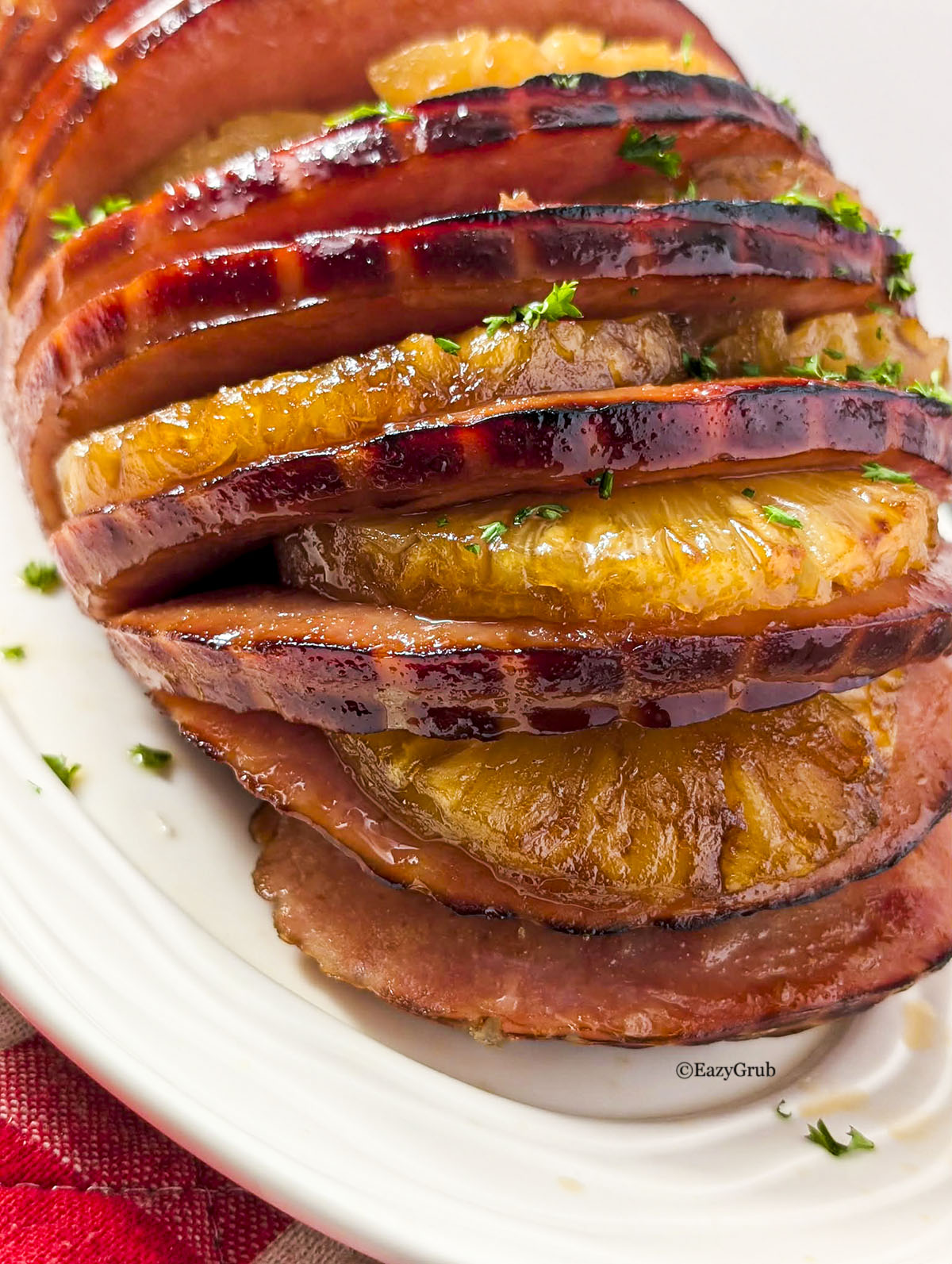 Pineapple boneless ham on a white platter