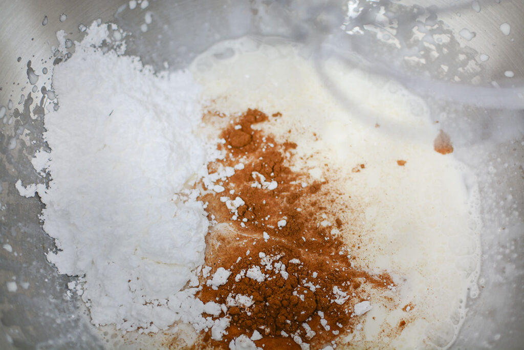 Cinnamon, powdered sugar and vanilla in the whipping cream.