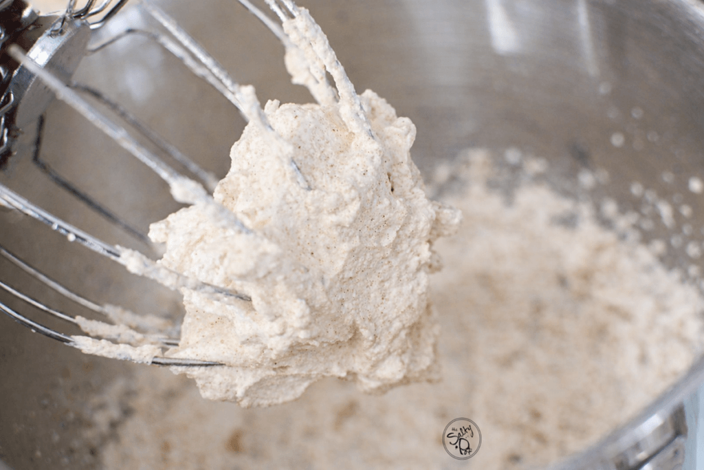 the cinnamon whipping cream in the bowl all whipped up.