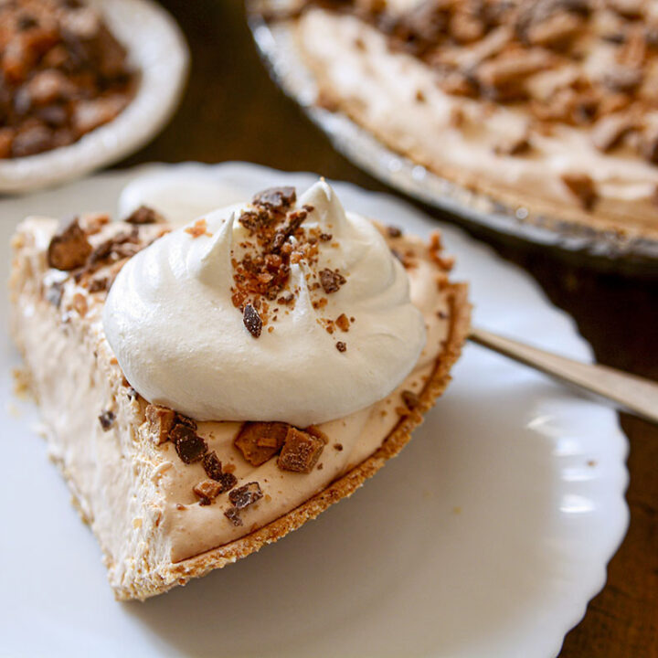 No-bake butterscotch pie slice on a white plate.