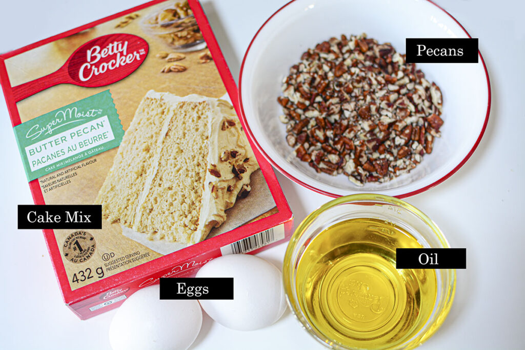 ingredient photo for the cookies. Butter pecan cake mix, optional chopped pecans, eggs and oil.