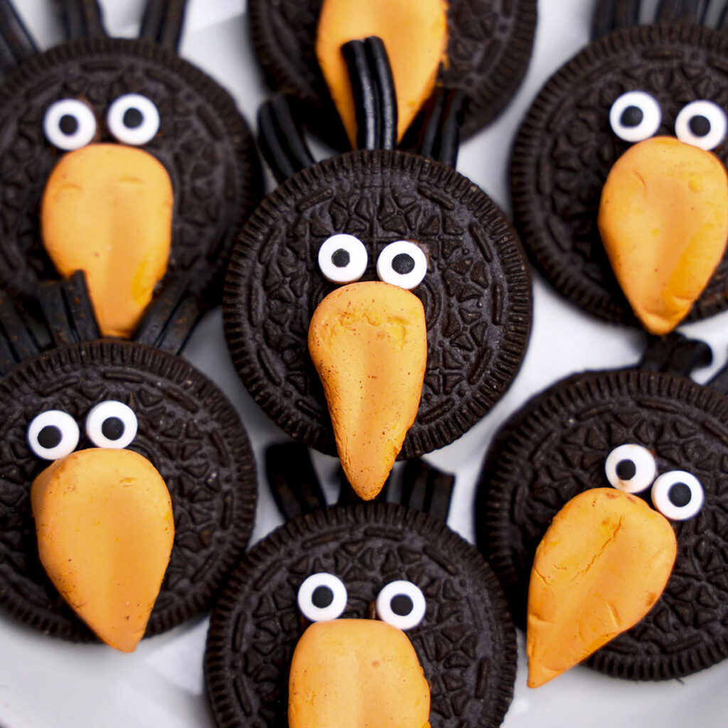 Crow Oreo Cookies on a white plate.