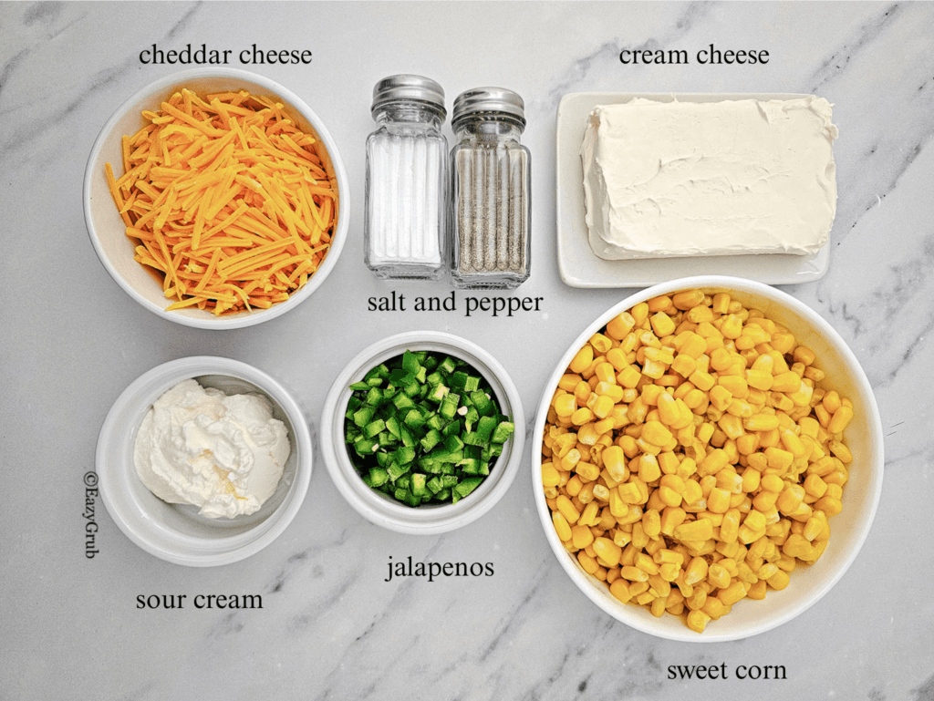 view of various dip ingredients arranged in bowls on a marble counter