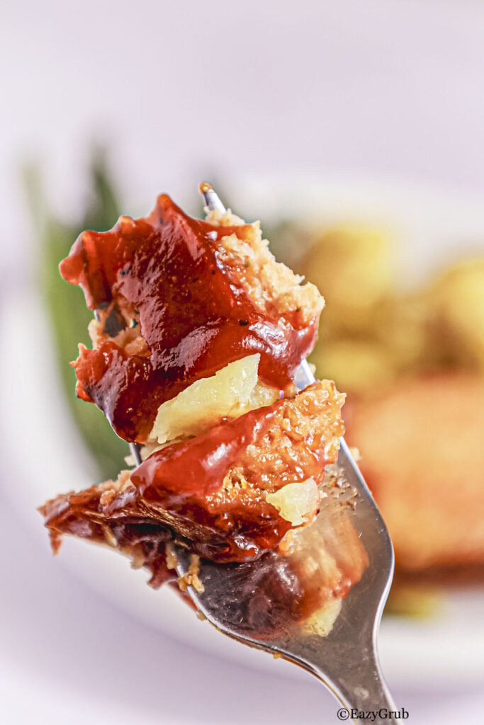 Fork shot of the cooked chicken meatloaf.