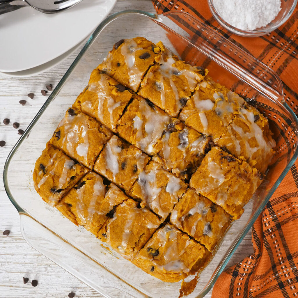 A pan of pumpkin bars with chocolate chips.