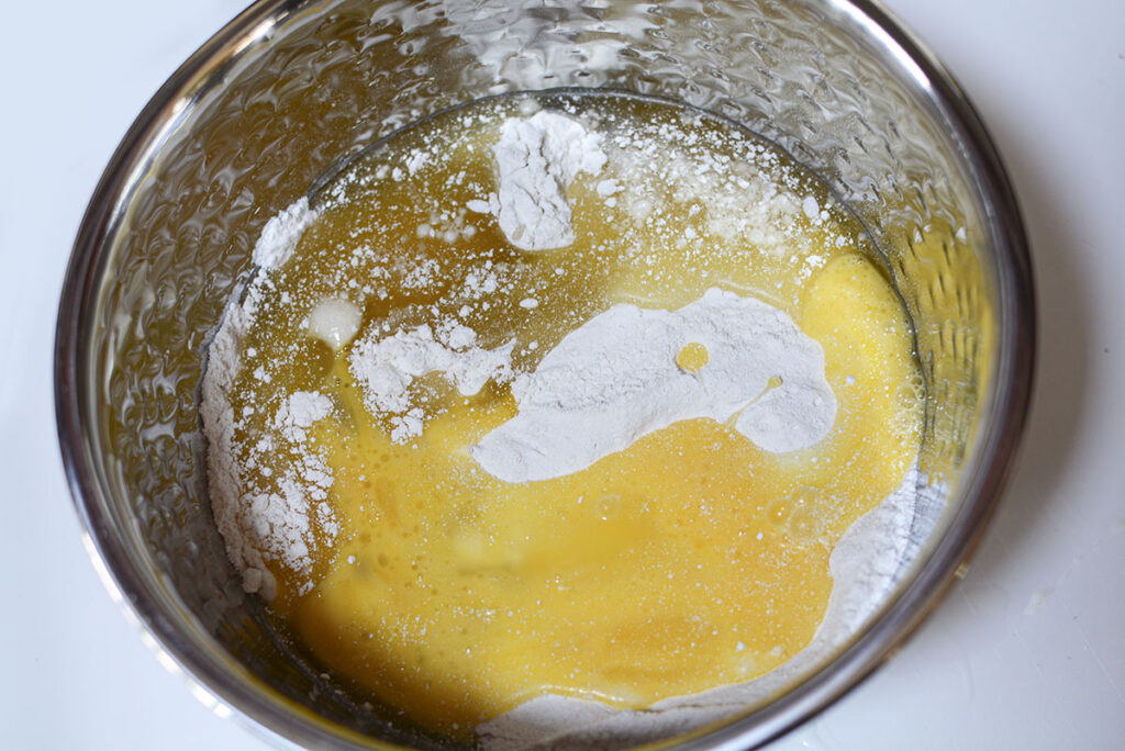 Eggs, cake mix, and oil in the bowl.